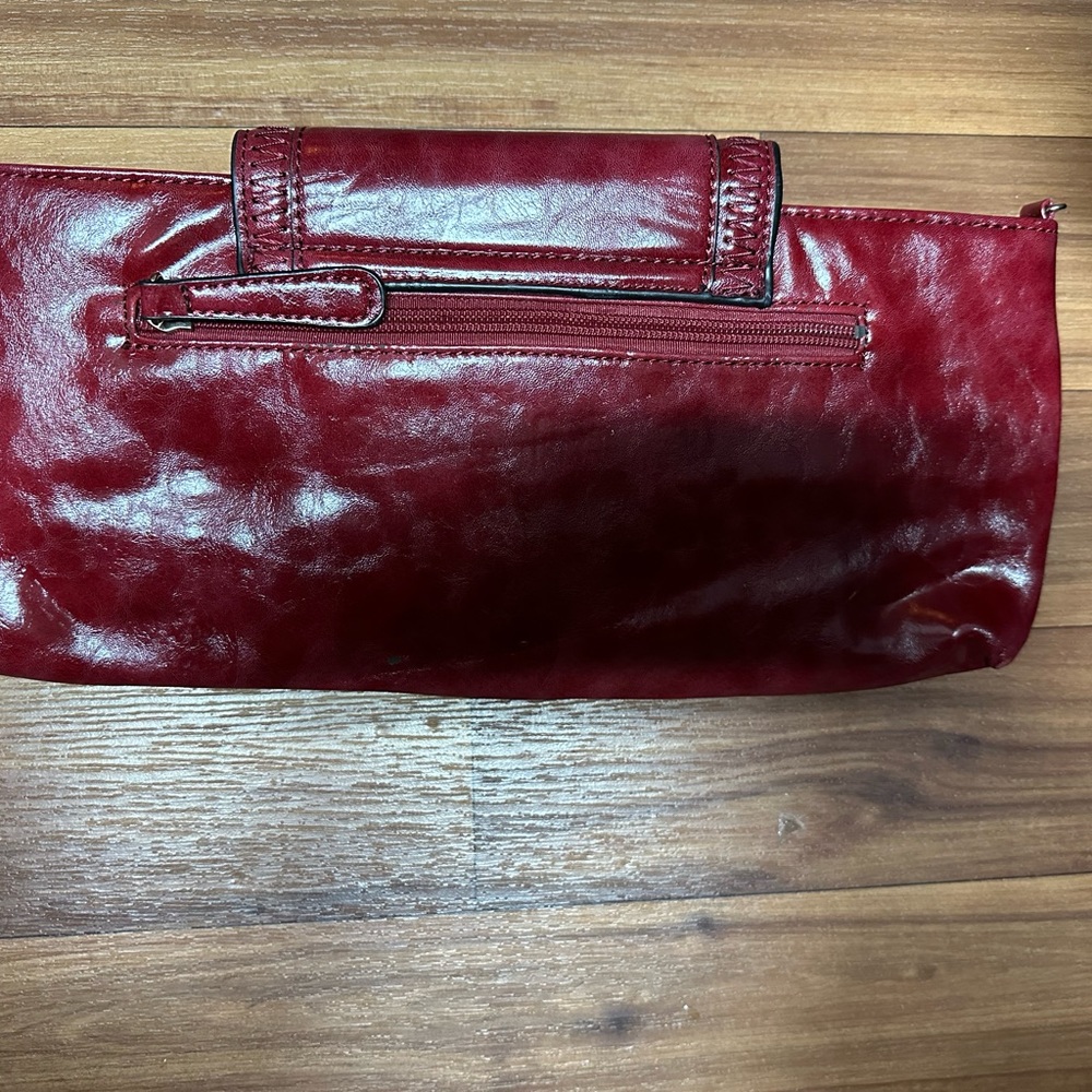 Burgundy clutch bag